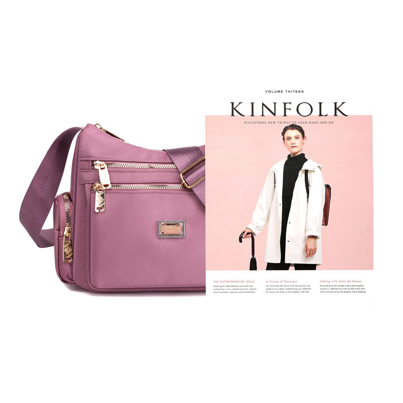 The 2025 new women's crossbody bag, a nylon color-blocking single-shoulder bag, is designed as a large-capacity, multi-layered, simple middle-aged mom bag Item Picture