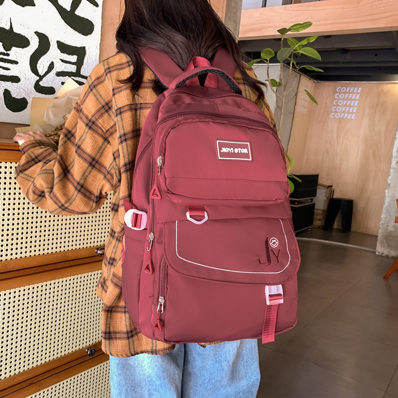 This backpack is versatile for girls, has a large capacity, is cute for junior high school and senior high school students, and is a lightweight backpack for sixth graders in primary school details Picture