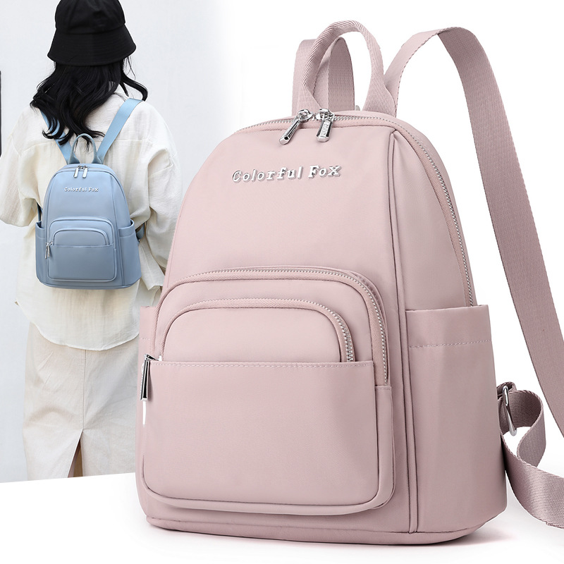 Colorful Fox's new Korean-style backpack for women is a fashionable and trendy multi-layered backpack with a large capacity for travel full figure
