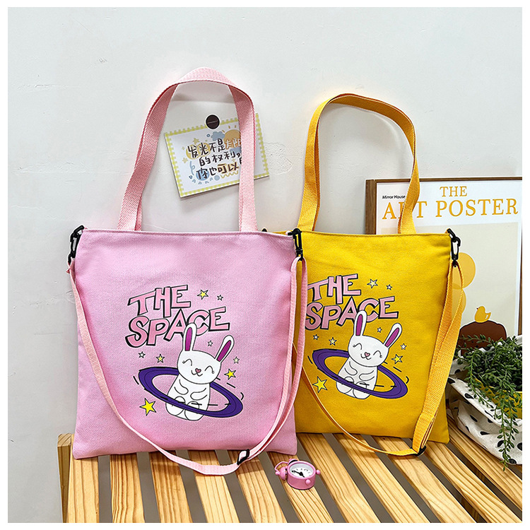 Cute student canvas bags in stock and hot sale. Cartoon rabbit printed tote bags, fashionable and simple shopping bags wholesale details Picture