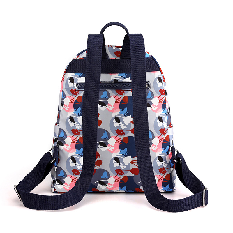 The new women's backpack is made of fresh Oxford fabric and has a large capacity. It is a simple, fashionable, casual and lightweight travel backpack Item Picture