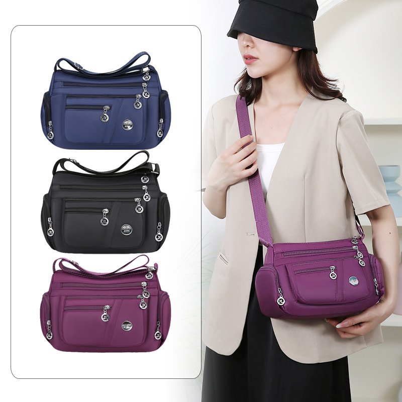 A new popular women's crossbody bag with multiple layers made of Oxford fabric, fashionable, casual and trendy. It's a single-shoulder bag for middle-aged and elderly mothers full figure