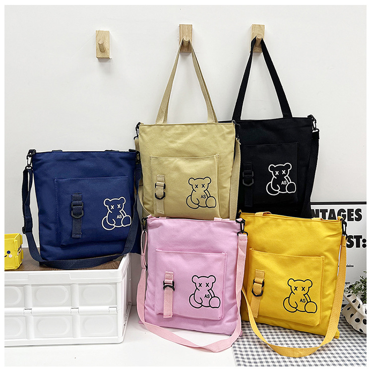 Large-capacity women's bag manufacturer in stock, fashionable Korean-style single-shoulder canvas bag, ins, high school and college students' hand-held tutorial bag full figure