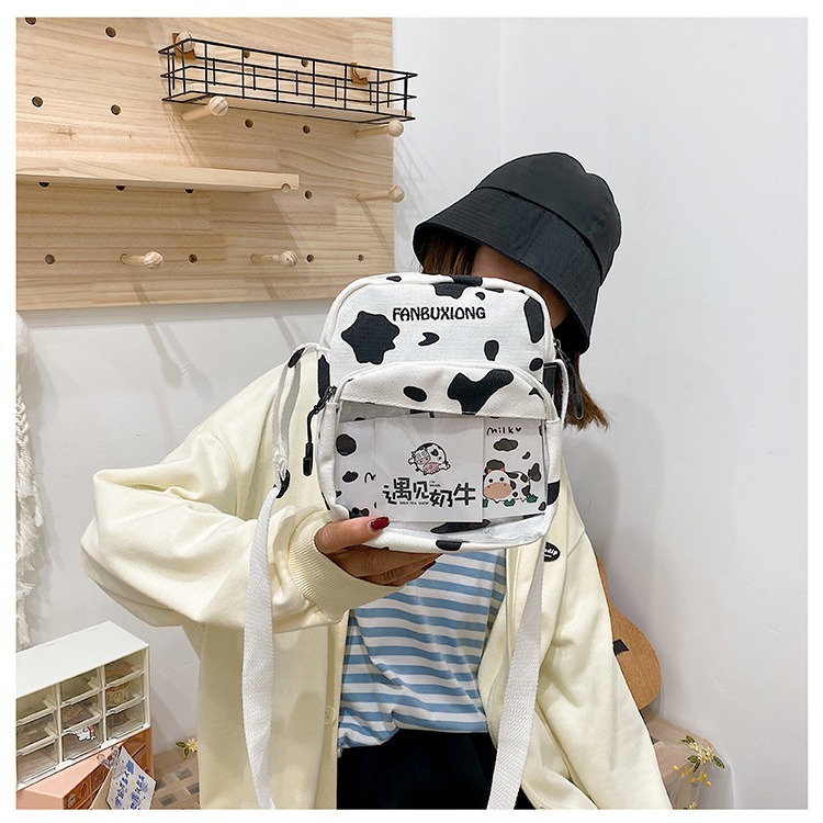 Wholesale of 2024 new Korean-style streetwear single-shoulder crossbody bag with cow pattern and simple canvas bag Application Scenario