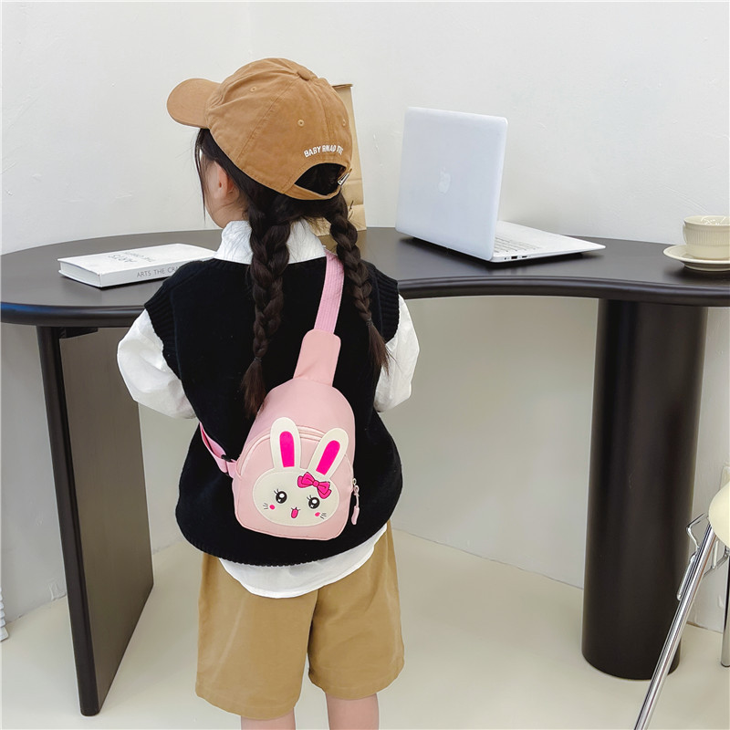 Cute children's small bag, cartoon rabbit girl crossbody bag, kindergarten baby canvas loose change accessory bag Application Scenario