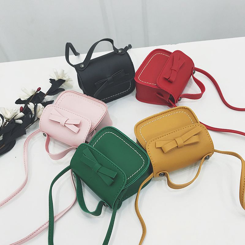 Children's crossbody bag 2020 New Korean-style girls' bow simple and fashionable baby single-shoulder loose change accessory bag full figure