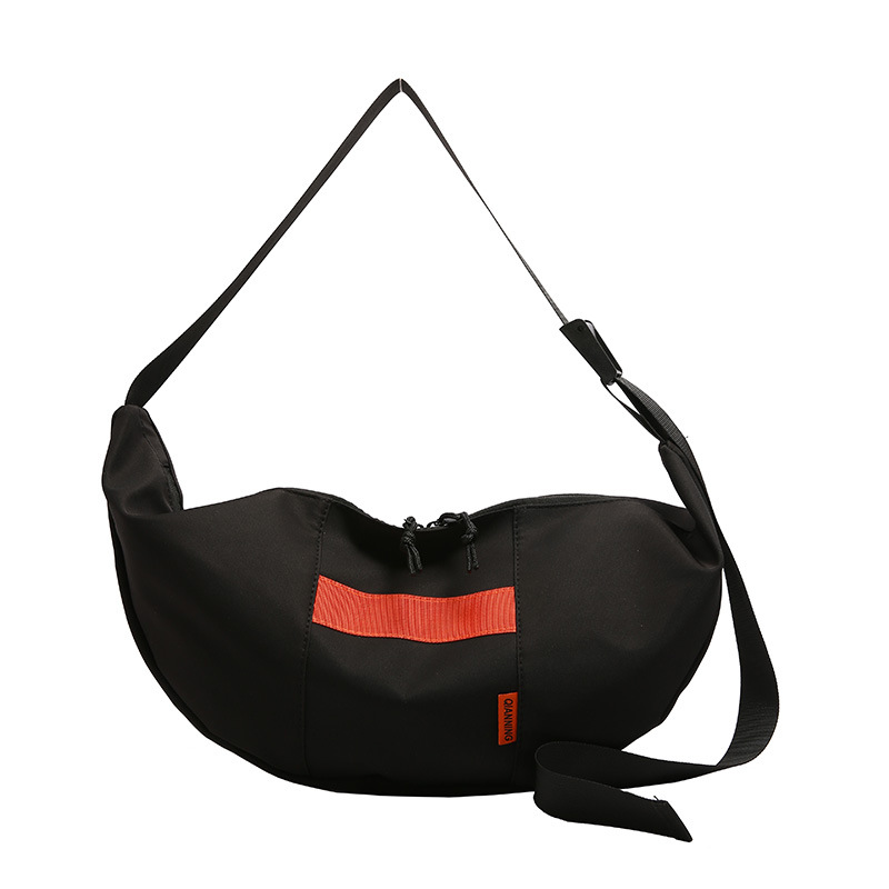 The new large-capacity Korean streetwear crossbody bag is selling well. It's a casual postman single-shoulder bag for students and a simple dumpling bag for girls Item Picture