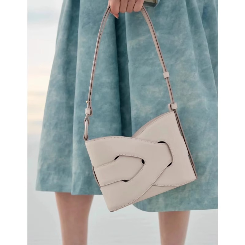 A niche woven underarm bag for women in 2025, a high-end and light luxury single-shoulder crossbody geometric bag for women details Picture