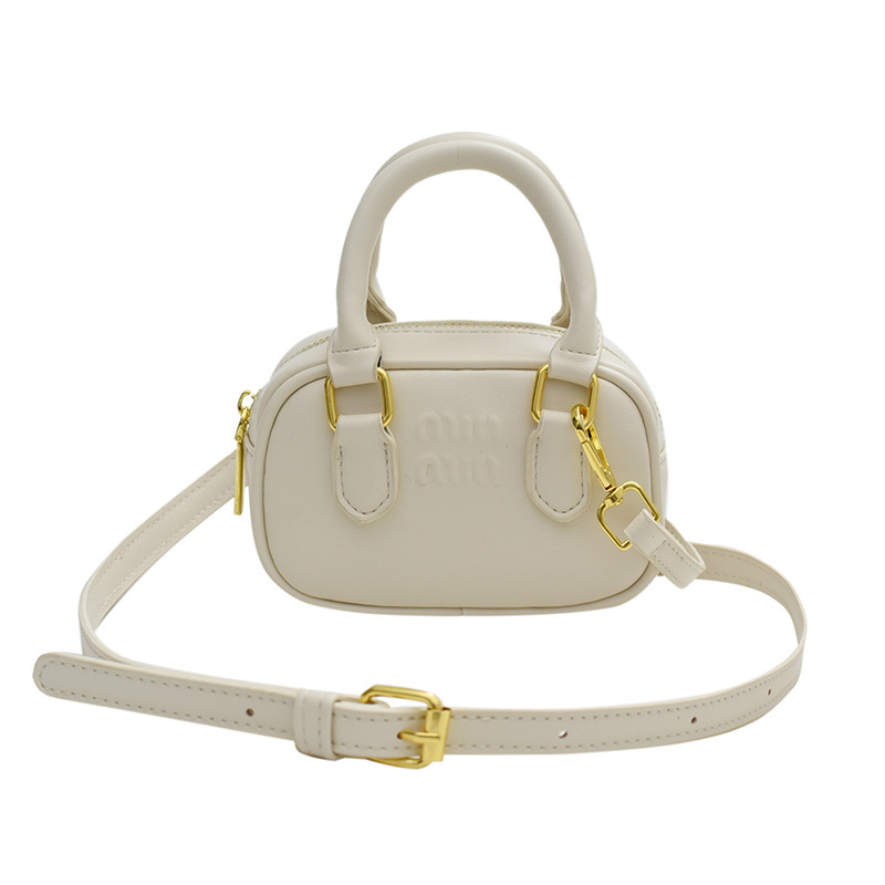 A new retro mini handbag for girls in the autumn and winter of 2024, featuring hand-held, crossbody and parent-child accessories Item Picture