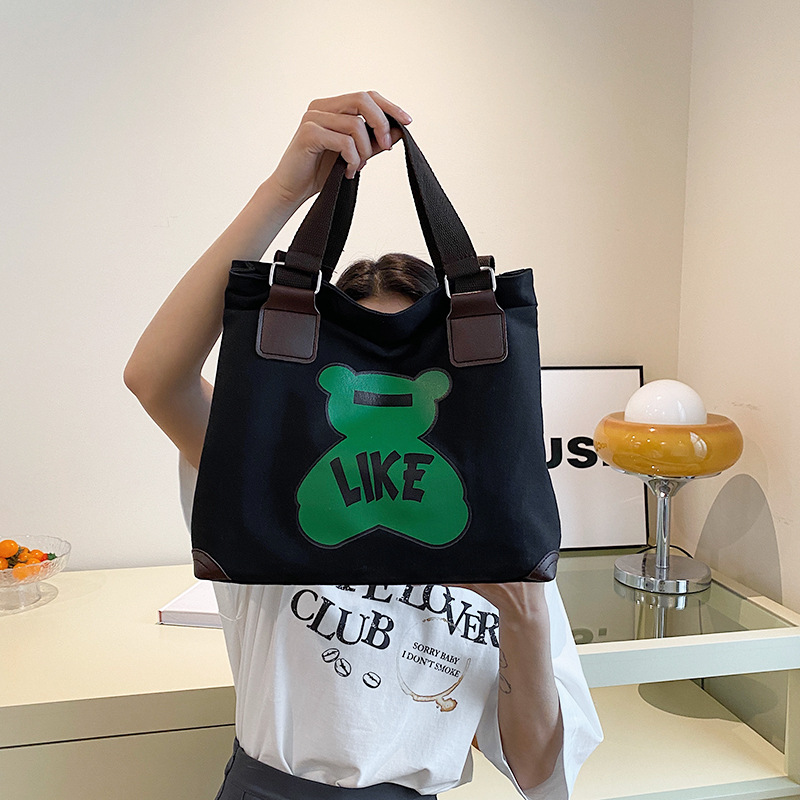 Large-capacity fashionable bags are selling well. New high-end style class bear canvas bags, student hand and shoulder tote bags for girls Specification drawing