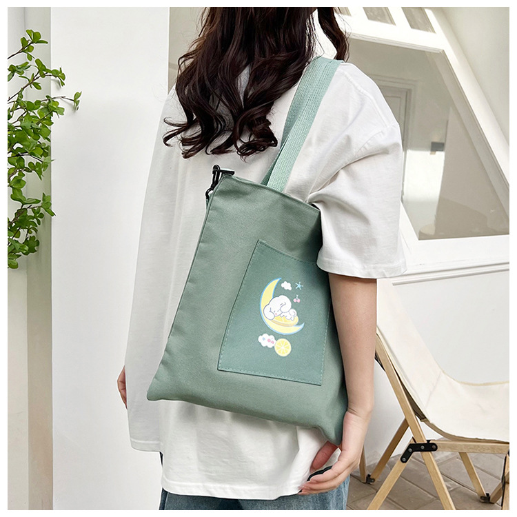 Casual solid-color canvas bag 2024 bestseller, simple and versatile, large-capacity single-shoulder bag, outdoor versatile packaging, book bag for women Application Scenario
