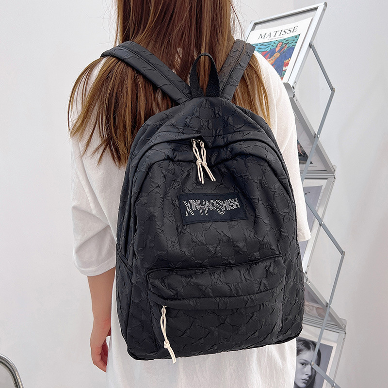 Korean ins artistic trend checkerboard checkered backpack, Japanese Harajuku style fresh and clean high school and junior high school student bag Application Scenario