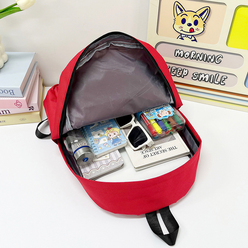 New Crayon Shin-chan cartoon children's backpack, cute and casual student schoolbag, plush toy backpack, cross-border Application Scenario