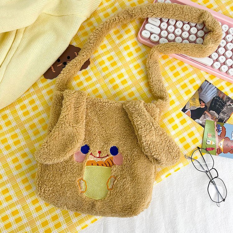This autumn and winter hand-held bag with big ears, cute animal-embroidered fur, and a simple lambskin large-capacity student backpack Application Scenario