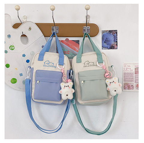 A Japanese niche double-sided multi-purpose bag for girls, a fresh and cute student single-shoulder bag, versatile carrying bear, +3 yuan details Picture