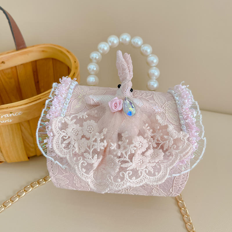 The 2025 new children's bag, a fashionable little chanel-style pearl princess bag, is a cute single-shoulder crossbody bag for little girls details Picture