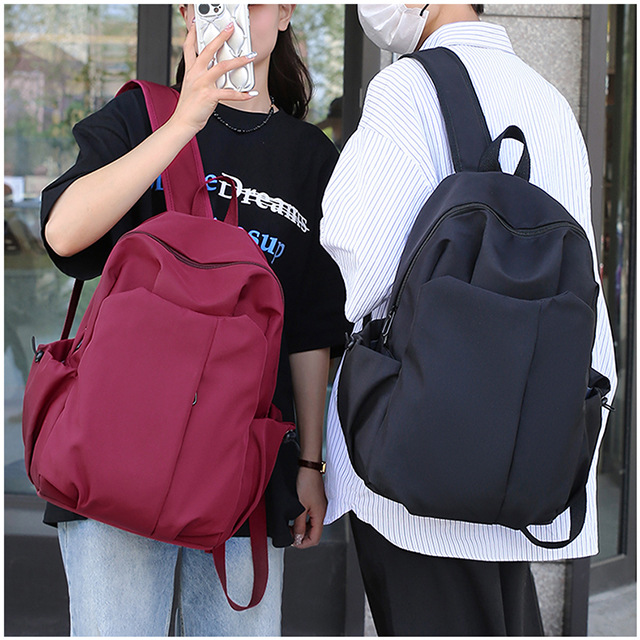 High-end men's large-capacity backpacks for junior high school and primary school students, women's simple, versatile and durable student bags, backpacks and schoolbags full figure