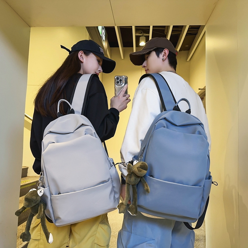 High-end men's and women's large-capacity travel backpacks for junior and senior high school students, simple and sporty new school bags, trendy computer bags details Picture