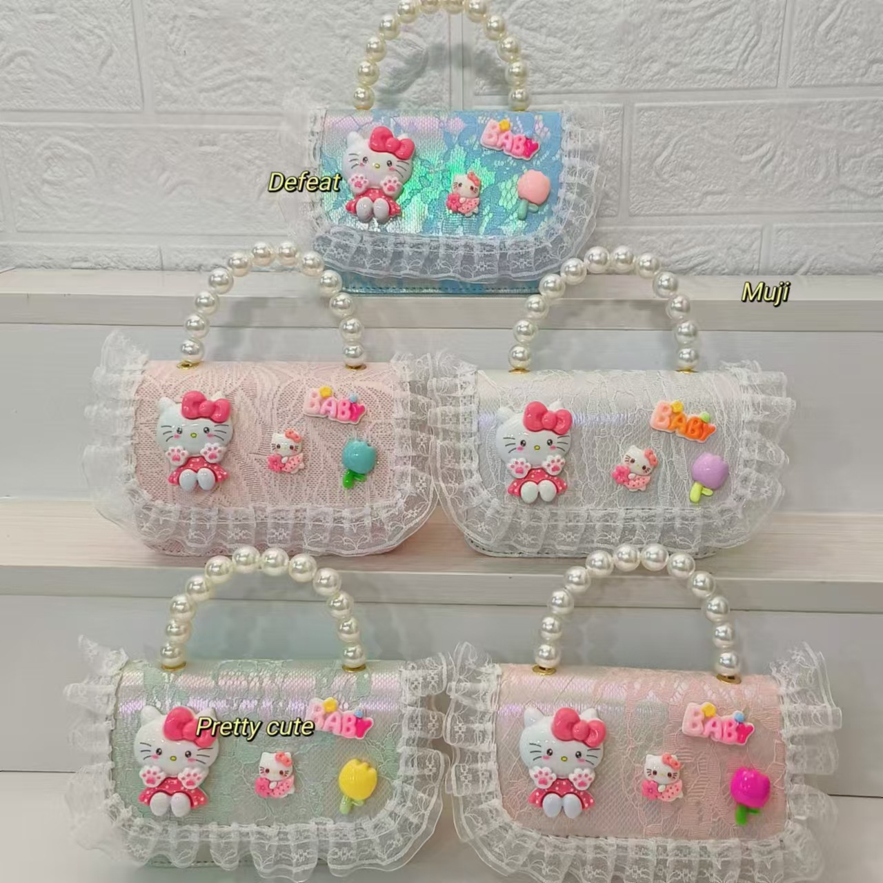 Cartoon KT cat bag, pearl handbag, single-shoulder crossbody bag, loose change accessory bag, chain bag, small square bag, children's bag details Picture