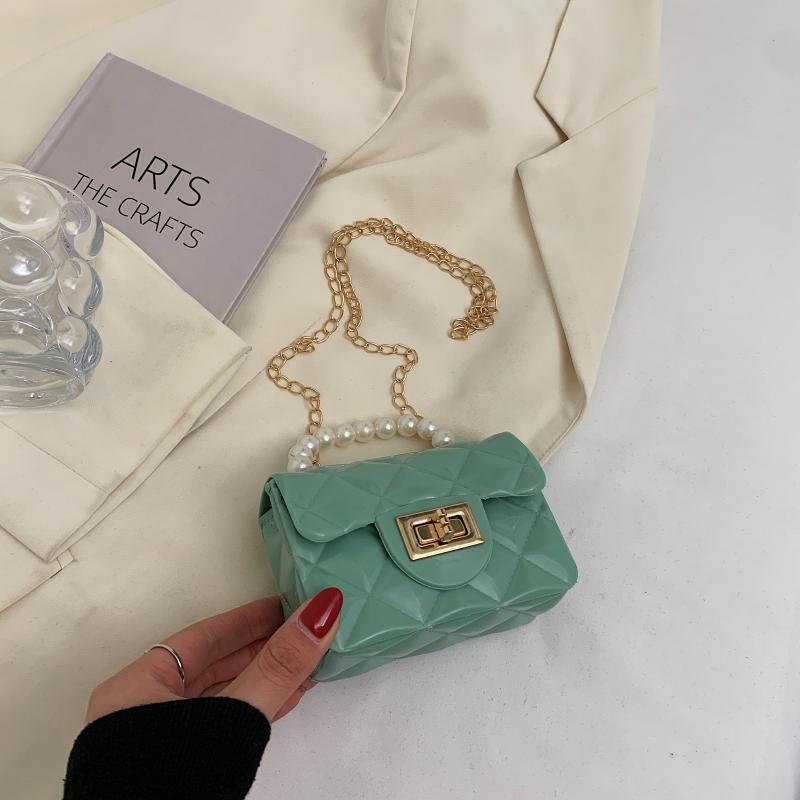 Children's bags 2021 New Style Girls' pearl Handbag, Little Chanel diamond-shaped Jelly Bag, mini single-shoulder crossbody bag details Picture