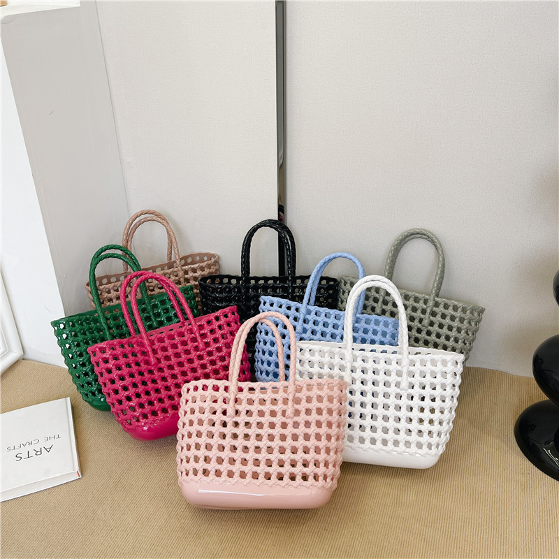 2025 Summer Hollowed-out woven jelly bag, hand-held vegetable basket bag, daily vacation and travel large capacity beach bag full figure