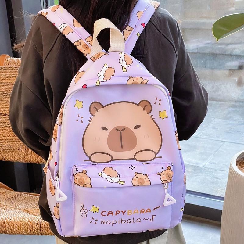 Trendy printed backpacks for junior high school and primary school students, large-capacity pressure-reducing backpacks, cute printed series student bags full figure