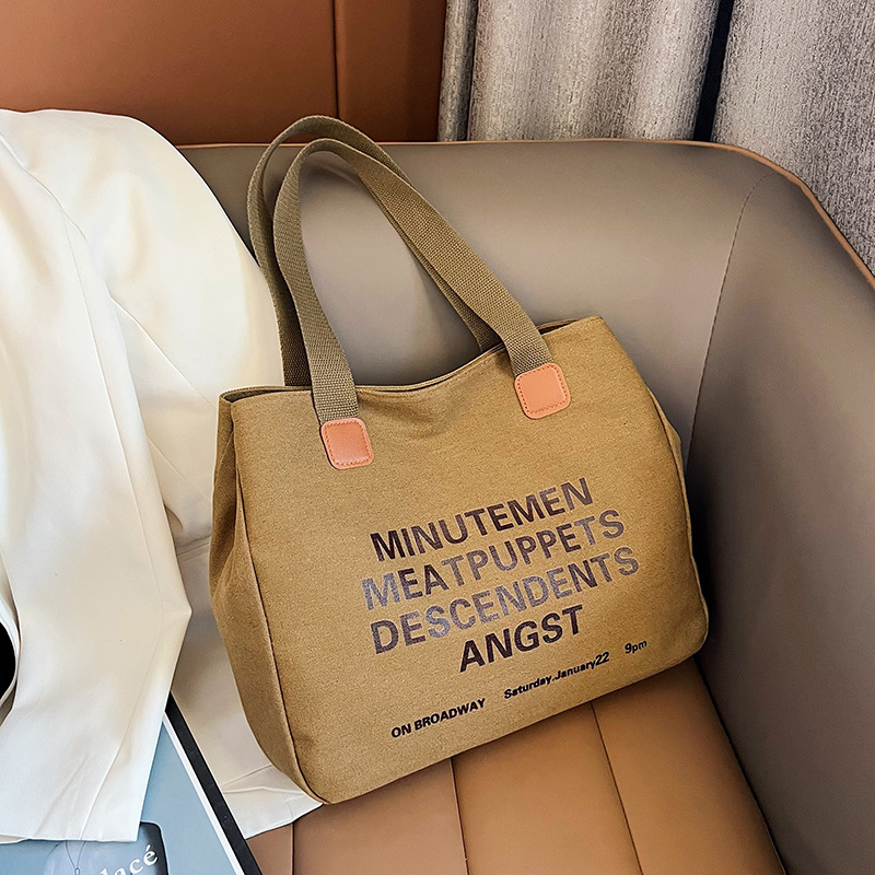 A new large-capacity canvas bag for students' school commute and travel, simple and versatile, crossbody hand-held canvas bag Specification drawing