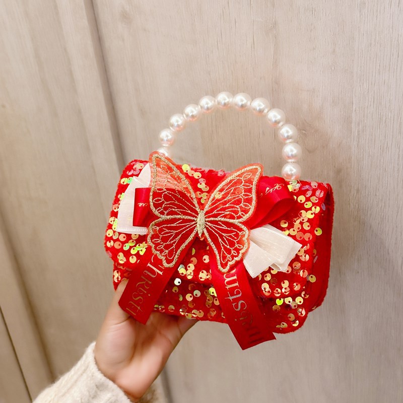 Small and cute girl's handbag, fun and fashionable bow children's bag, Korean-style pearl hand-held crossbody bag for women Application Scenario