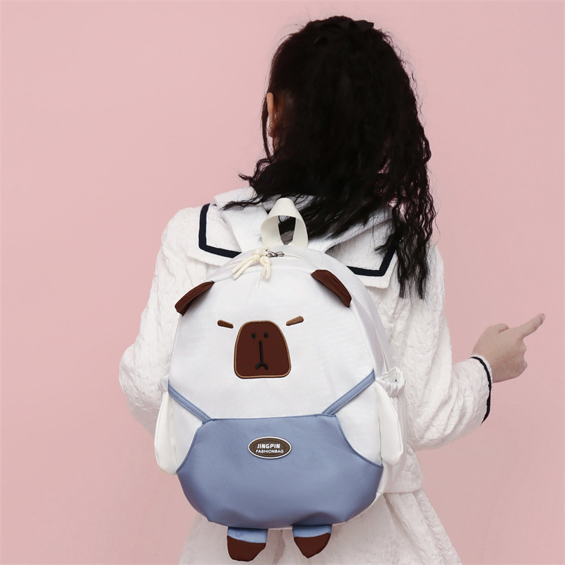 New cute schoolbag for primary school students, Capibarra fun color-blocked backpacks for boys and girls, high-quality Oxford cloth backpacks Application Scenario
