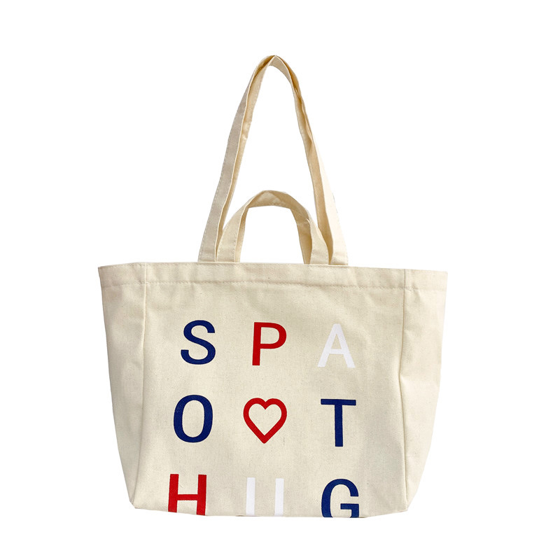 A large-capacity, sturdy Japanese-style canvas bag for women, a new 2022 simple bento handbag for girls to go to work Item Picture