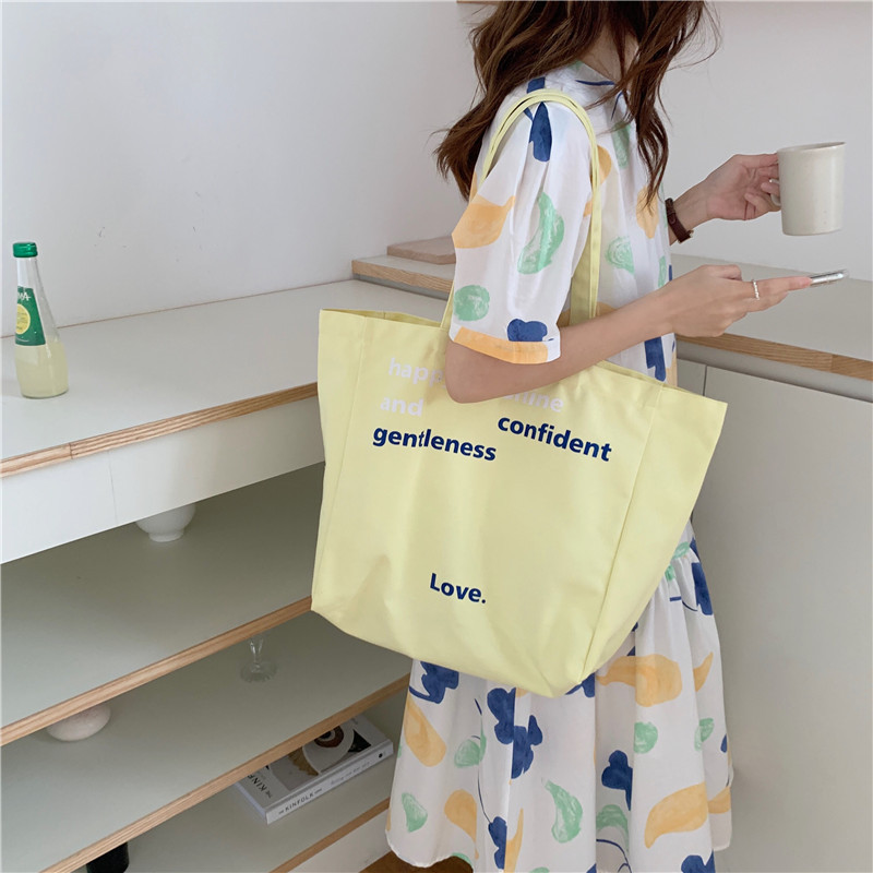 1663 New letter-printed canvas bag for female students, Korean laid-back style large capacity hand-held shoulder bag details Picture