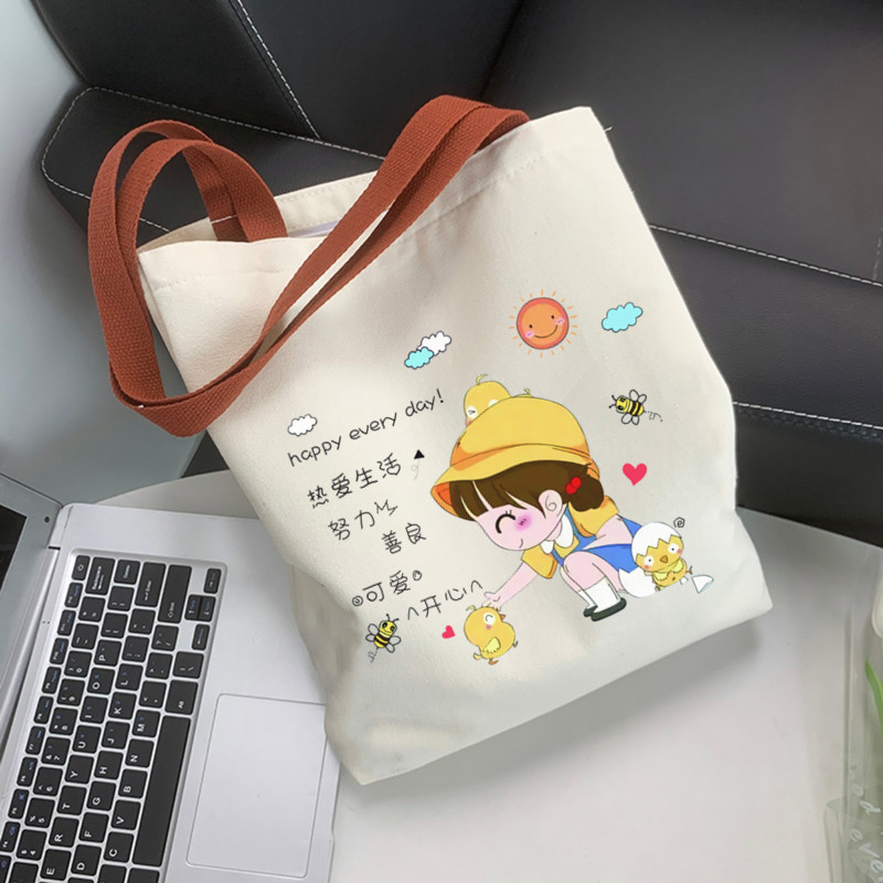 A new canvas bag for women, a single-shoulder bag for college students to attend classes, a versatile large-capacity bag for commuting, and a niche shoulder bag and handbag Application Scenario