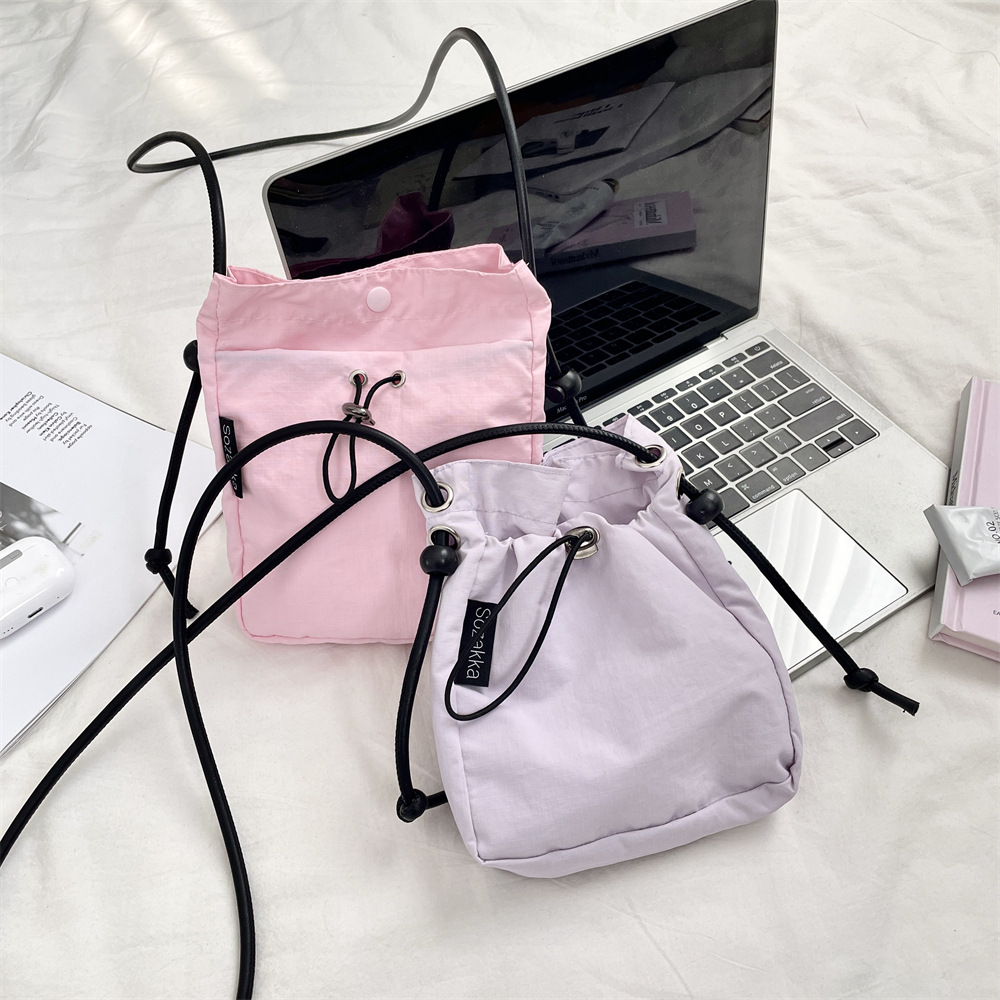53192 Niche crossbody bag, solid color, Japanese and Korean artistic single-shoulder crossbody bag, lightweight phone bag, sporty and casual bag details Picture