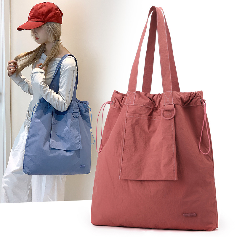 New lightweight, large-capacity, versatile, casual and laid-back Korean-style solid-color women's bag, nylon fabric single-shoulder underarm tote bag details Picture