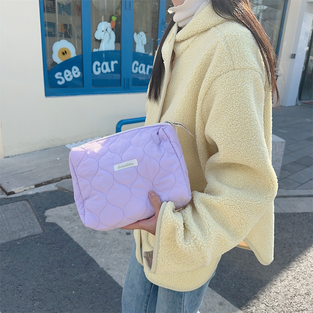 31293 Soft and tender yellow cosmetic bag, high-end large-capacity portable cosmetic storage bag for women, hand-held bag full figure