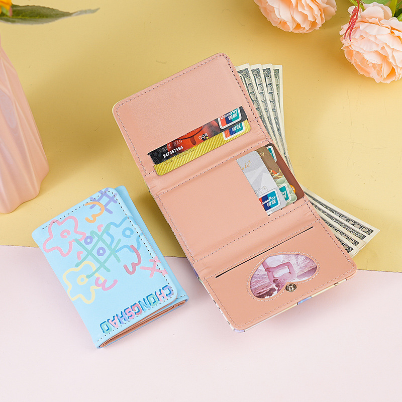 This is a new minimalist, colorful graffiti short, cute and niche design for women. It features a foldable, compact and multi-slot three-fold wallet Specification drawing