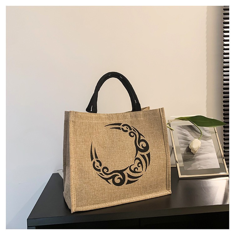 The new 2024 trendy and ethnic style retro linen handbag is a simple and fashionable shopping bag for women details Picture