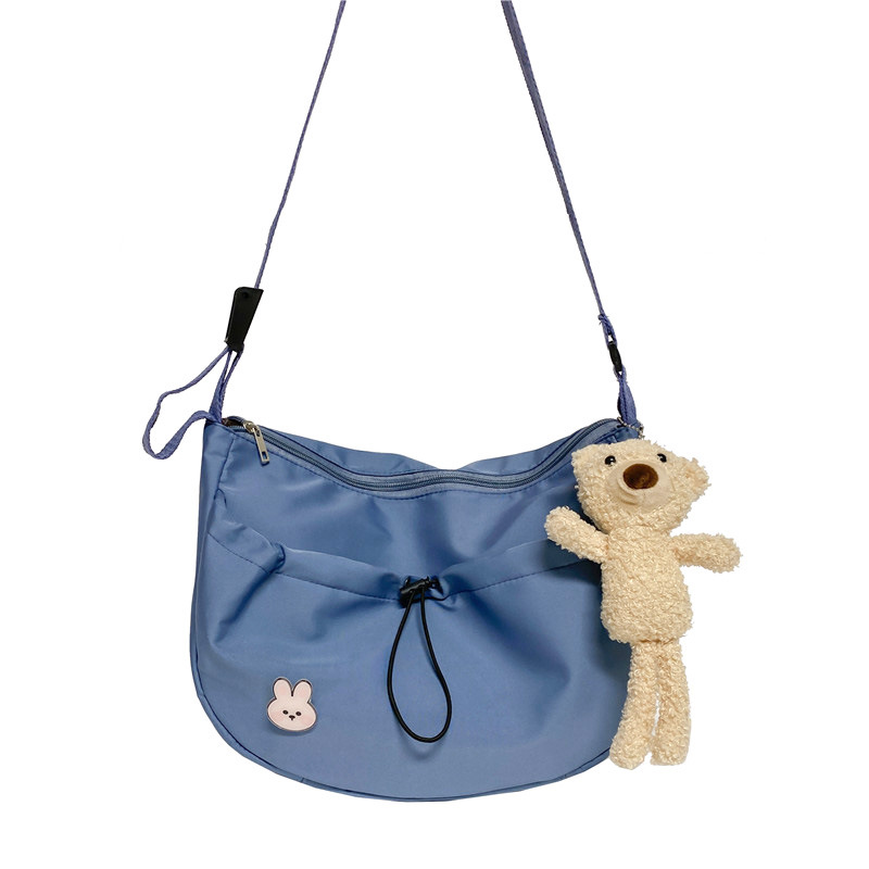 The new 2022 Little Bear canvas small bag for women is simple and versatile. The student dumpling bag is a trendy casual single-shoulder crossbody bag Item Picture