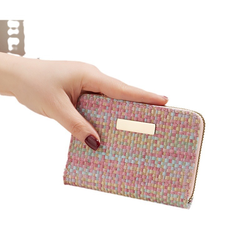 New pu Korean version wallet for women's wholesale trade, with a high-end design and a niche iriered woven hand-held card bag Item Picture