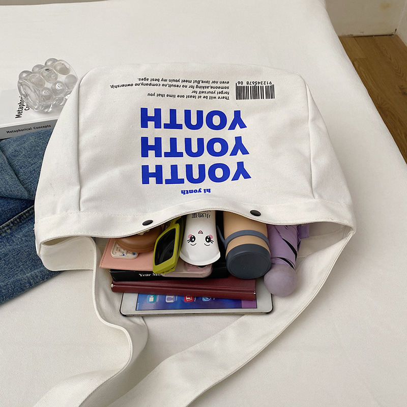 Korean-style canvas bag, artistic Japanese-style Instagram simple single-shoulder bag, school student schoolbag, men's large-capacity commuting bag Application Scenario