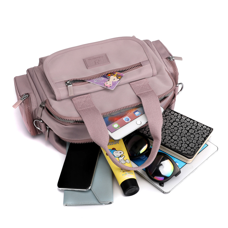 New cross-border women's fashion trend single-shoulder bag, large-capacity water-resistant nylon backpack, multi-layer commuting crossbody bag Application Scenario