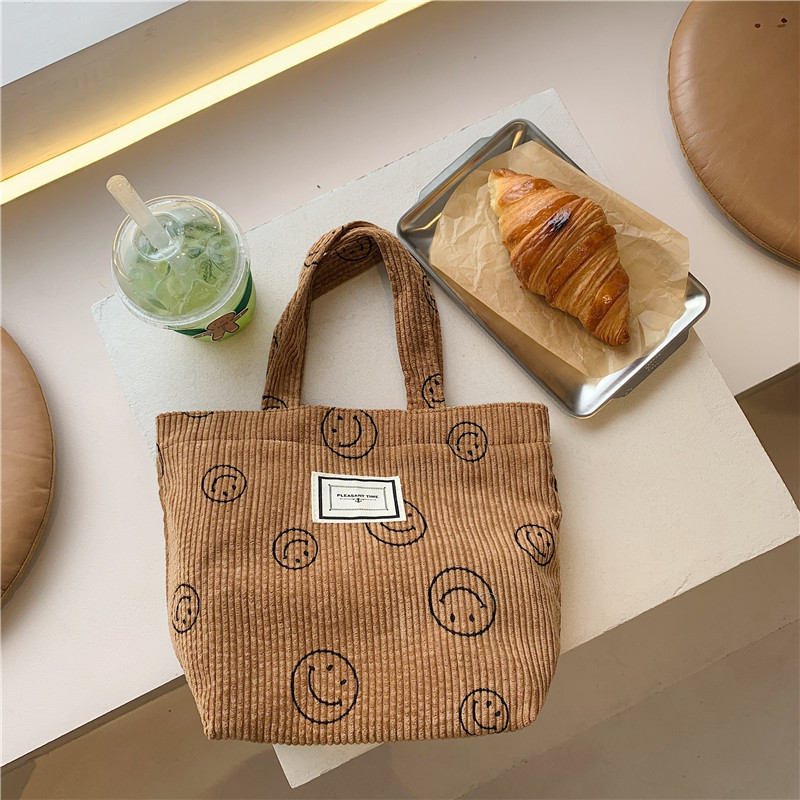 112221 New corduroy retro polka dot handbag, Japanese-style cute smiling face tote bag, women's bento bag Item Picture