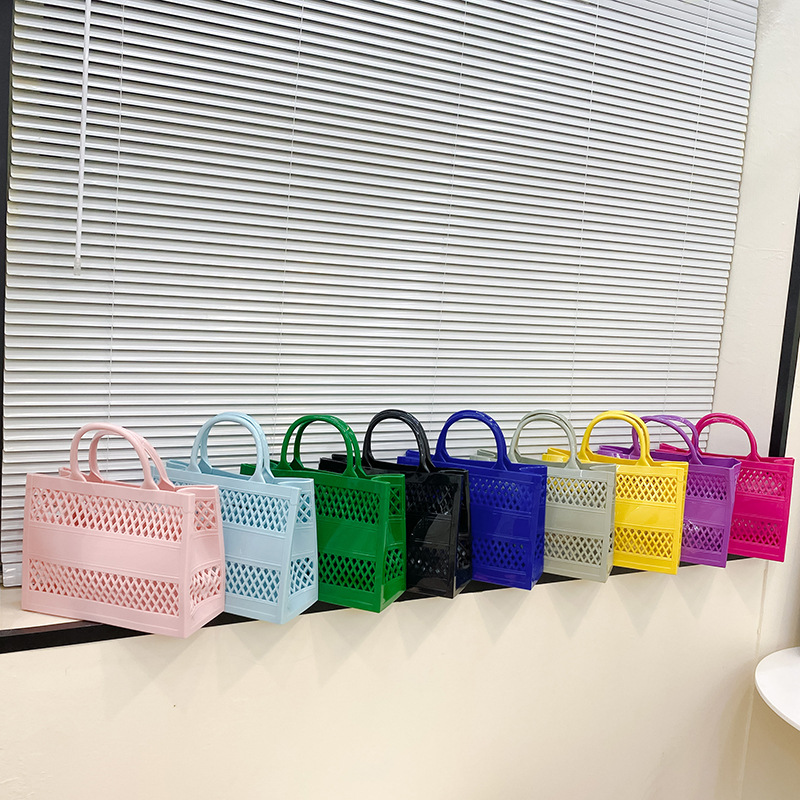 2025 Summer new shopping basket, hand-held pvc bag, jelly bag, large-capacity basket, storage basket, candy color, hollowed-out full figure