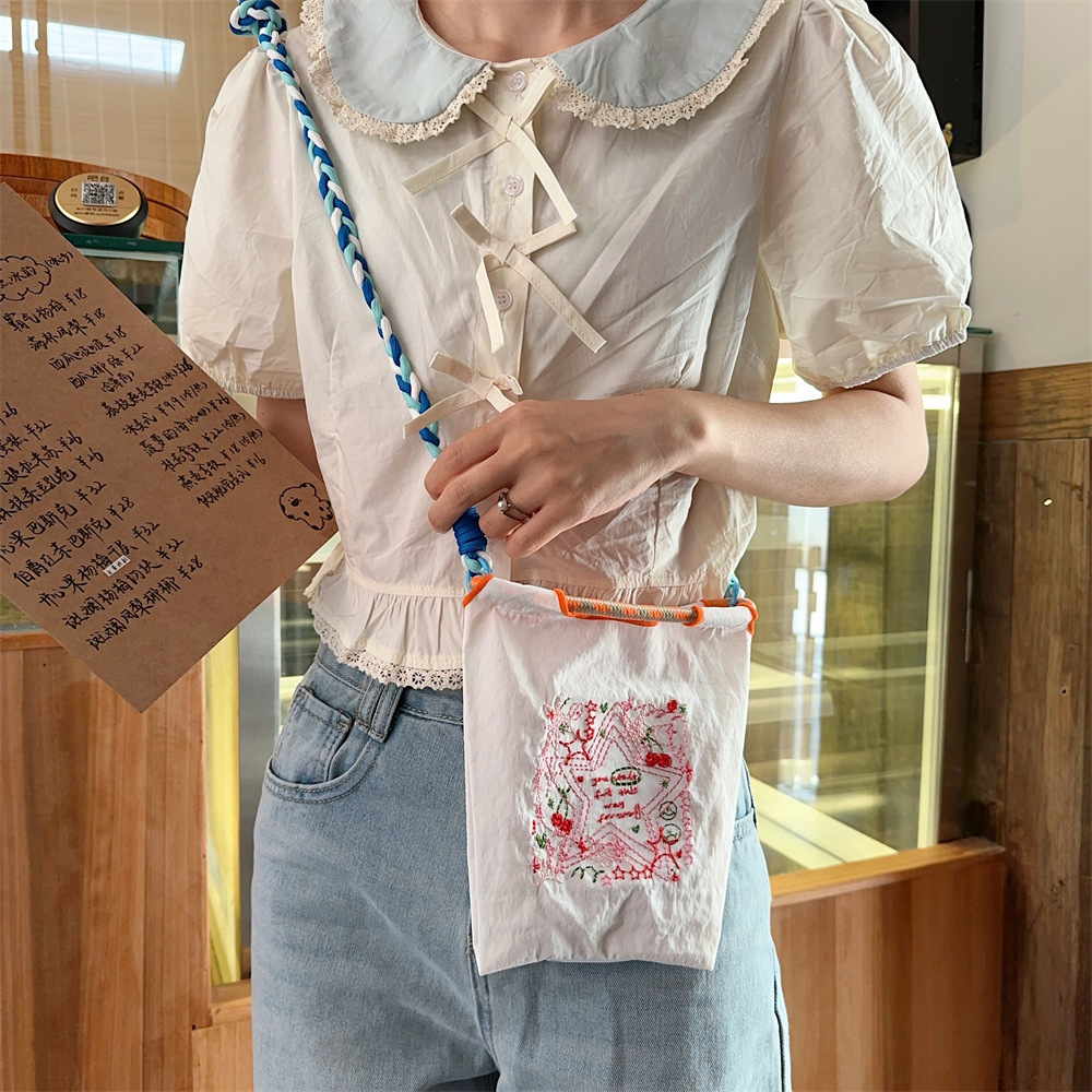 4691 ins mini embroidered Oxford cloth small bag, hand-carry bag, student crossbody and hand-carry cute storage bag details Picture
