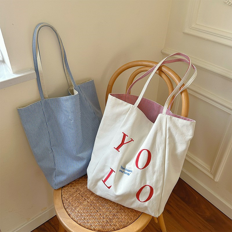 Canvas simple large-capacity bag for women, new summer 2025 double-sided single-shoulder bag, student class underarm tote bag details Picture