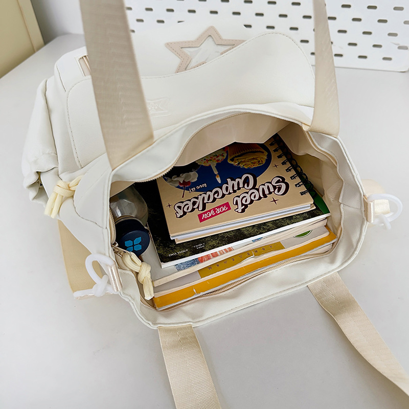 A new sweet Japanese-style girl's tutorial bag, a versatile Korean-style girl's crossbody bag, and a fresh and cute junior and senior high school tutorial bag Application Scenario
