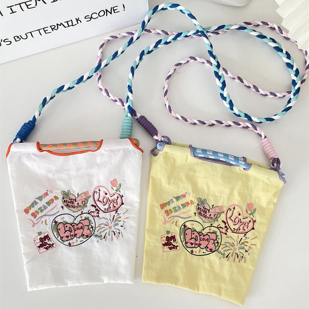 4691 ins mini embroidered Oxford cloth small bag, hand-carry bag, student crossbody and hand-carry cute storage bag Application Scenario