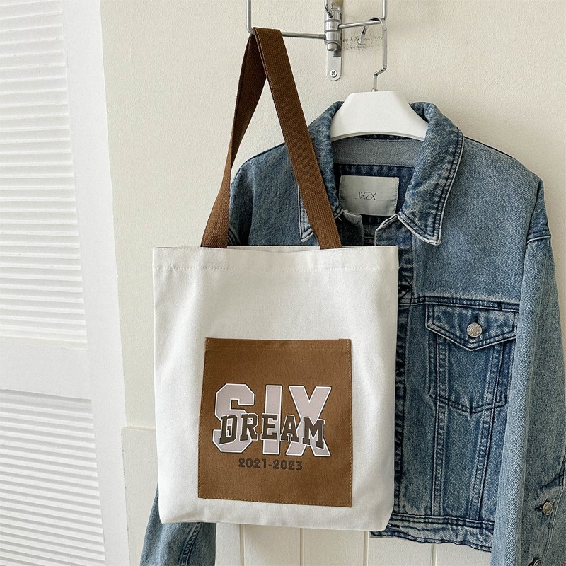 Wholesale of 2025 new casual and fashionable canvas bags, large-capacity single-shoulder bags for college students' shopping, and trendy tote bags Application Scenario