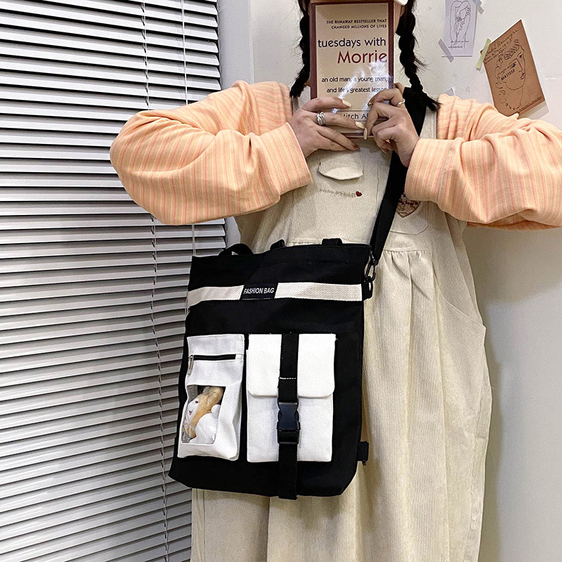 Factory wholesale 2021 new Korean-style canvas handbags, large-capacity multi-functional student cloth bags, four-use bags Application Scenario