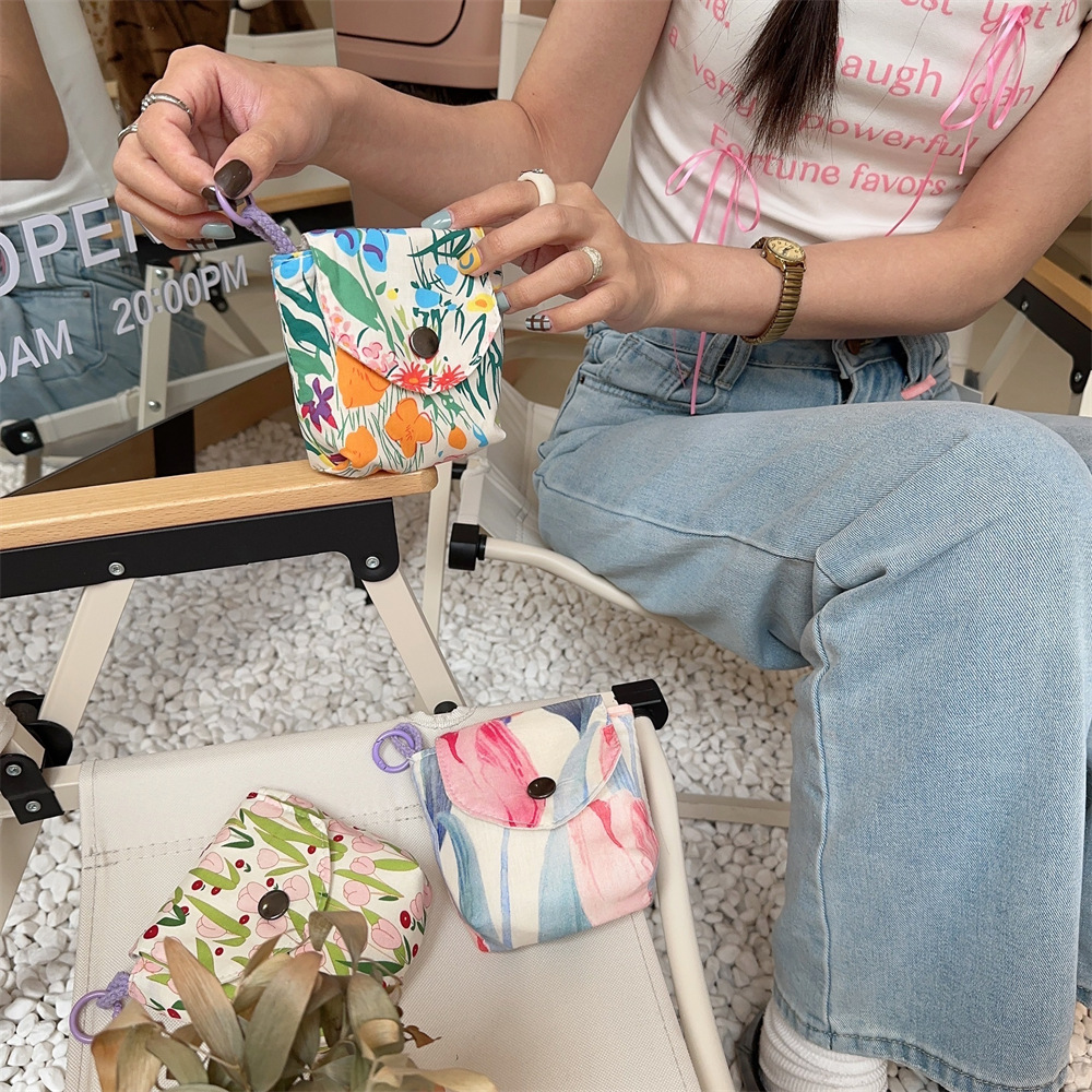 44113 Portable small mini storage bag, cute floral print portable student storage sanitary napkin bag storage bag Application Scenario